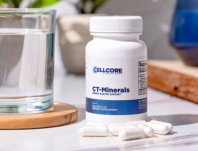 CellCore CT-Minerals bottle next to a glass of water