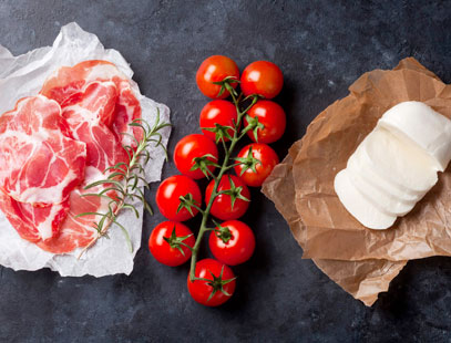 Spread of meat, cheese and tomatoes