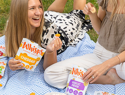 two girls eating whisps